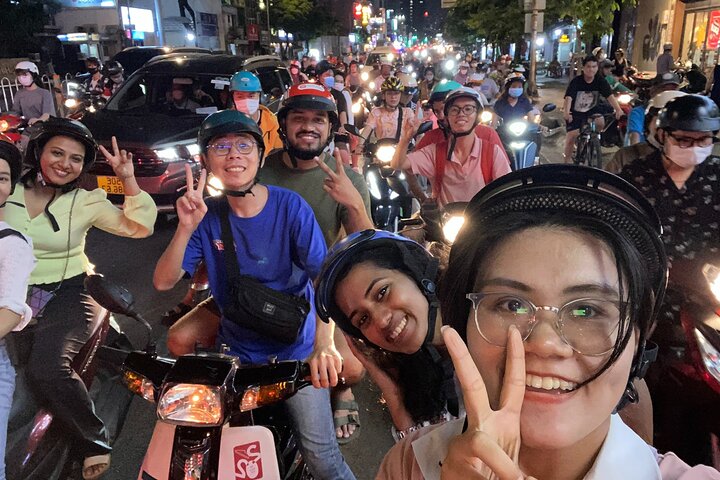 Ho Chi Minh Travel Guide - Saigon Food Tour by Scooter with Eleven Tastings