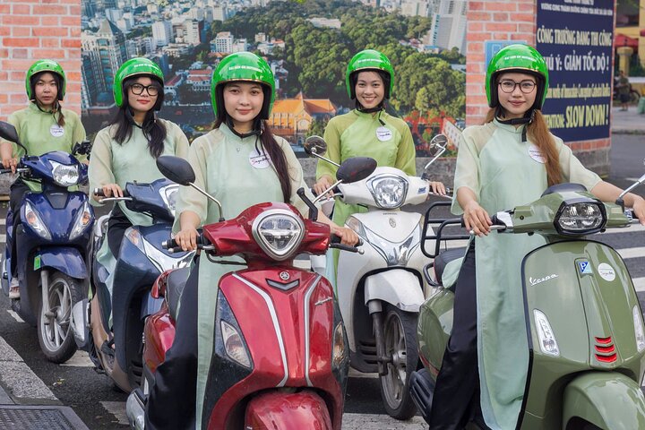Ho Chi Minh Travel Guide - Saigon by Night and Street Food by Motorbike Ao Dai Riders Option