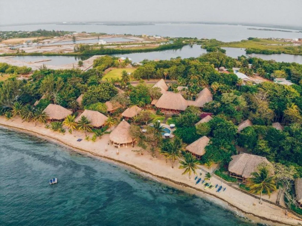 Turtle Inn Placencia Belize beachfront thatched cottage Caribbean reef