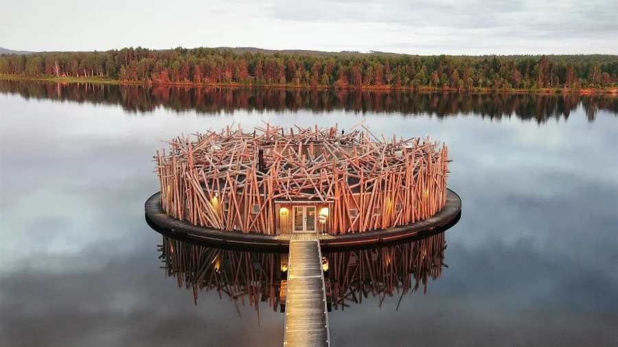 Arctic Bath Sweden unique hotel stay floating suite winter ice