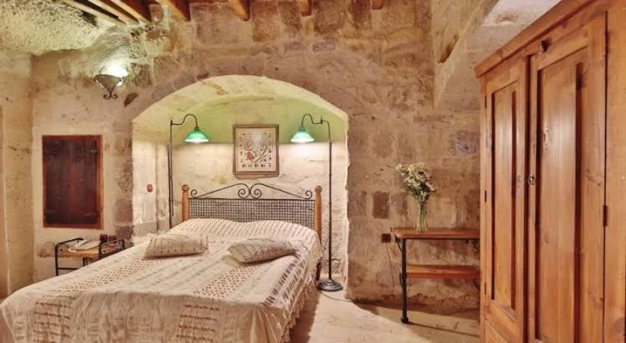 Sultan Cave Suites Goreme sunrise hot air balloons over valley