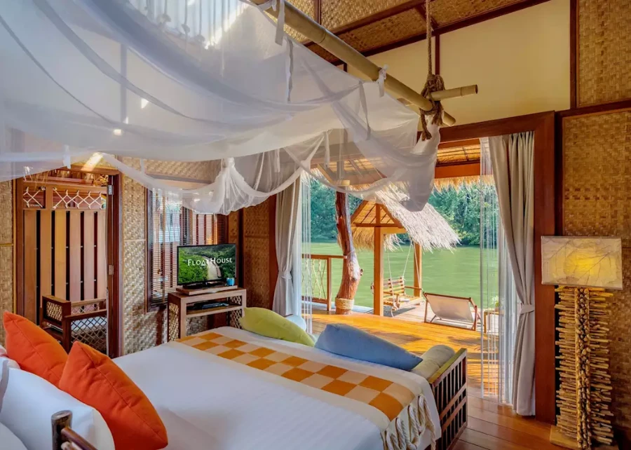 Float House River Kwai Thailand unique hotel stay thatched roof