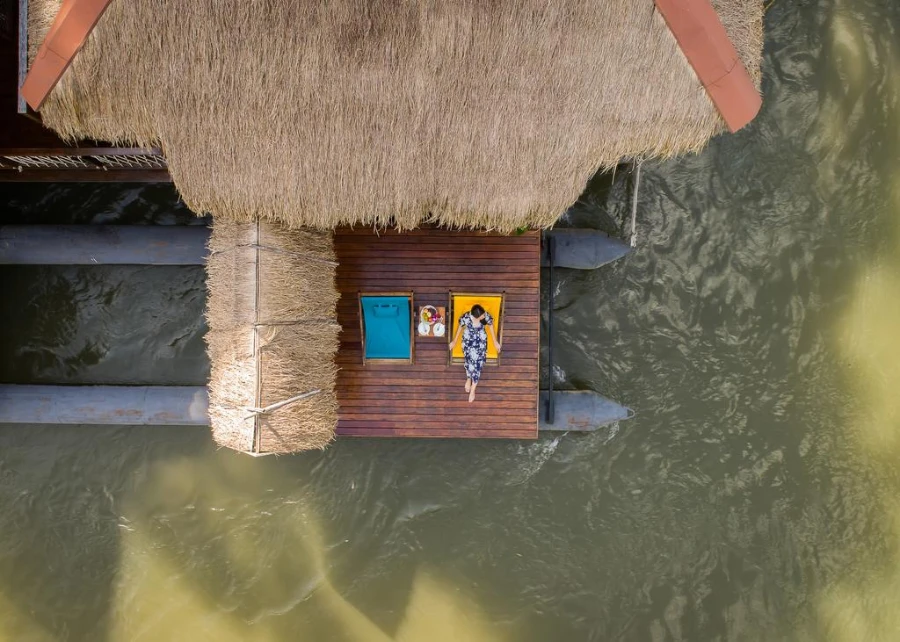 The Float House River Kwai balcony jungle river view Thailand